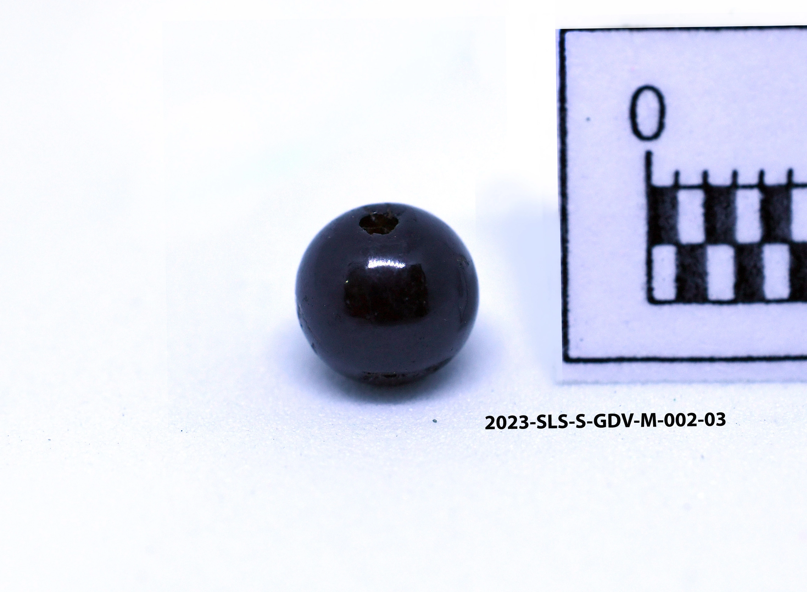 Garnet Bead — Maritime Archaeology Museum හි ඇති කෞතුක භාණ්ඩයකි