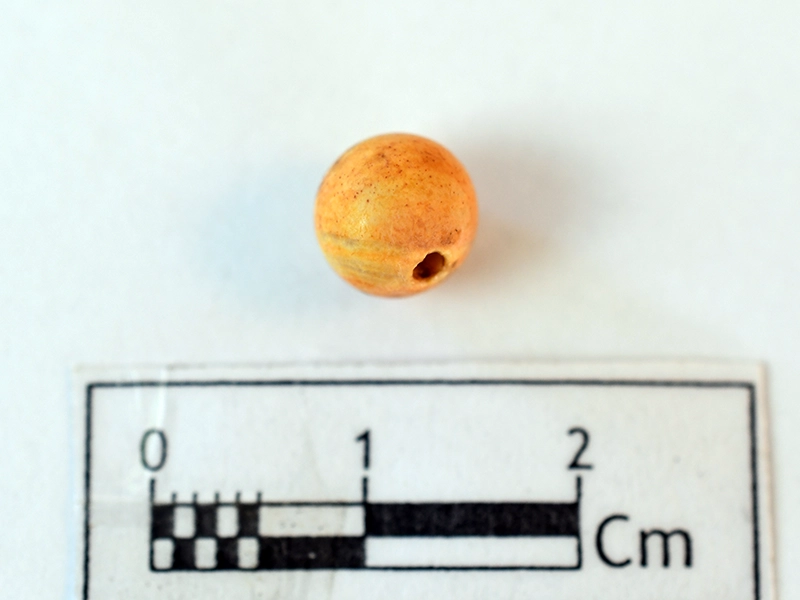 Carnelian Bead — Maritime Archaeology Museum හි ඇති කෞතුක භාණ්ඩයකි