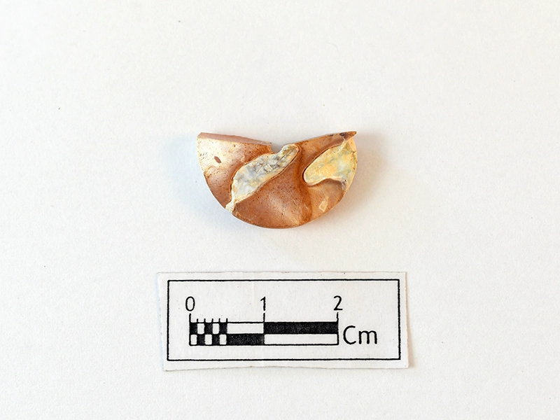 Oblate Disc Bead — Maritime Archaeology Museum හි ඇති කෞතුක භාණ්ඩයකි