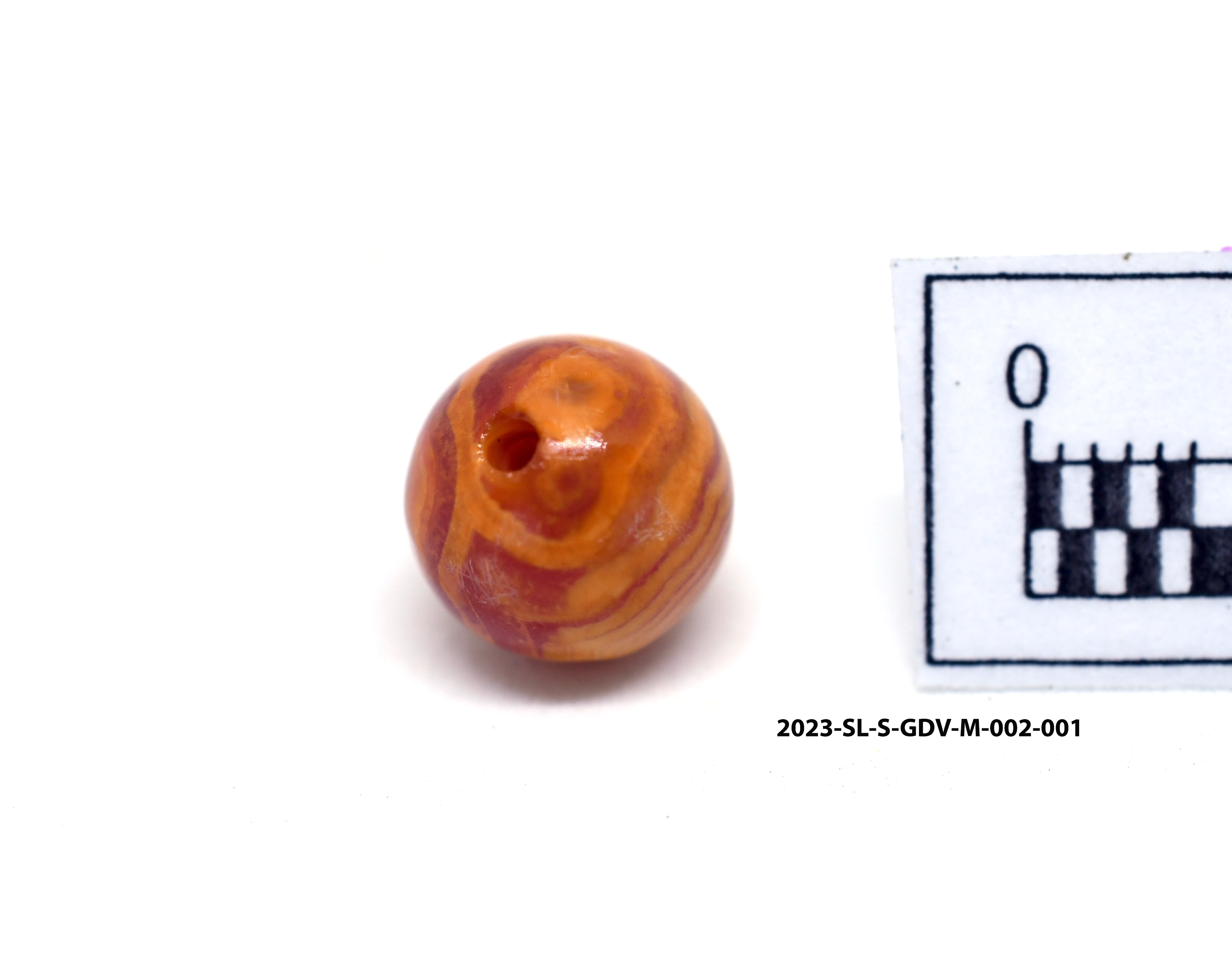 Carnelian Bead — Maritime Archaeology Museum හි ඇති කෞතුක භාණ්ඩයකි