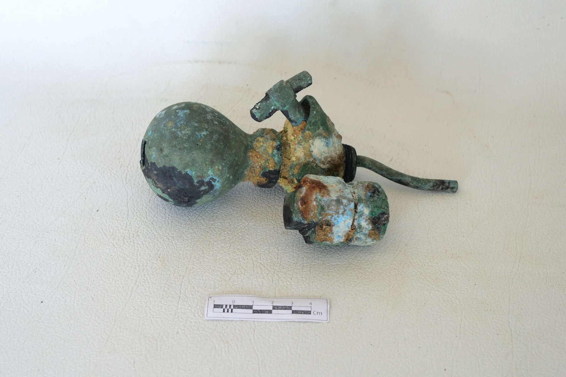A part of copper alloy tap — Maritime Archaeology Museum இல் உள்ள கலைப்பொருள்