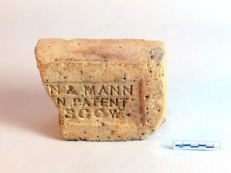 Brick with letters — artifact at Maritime Archaeology Museum