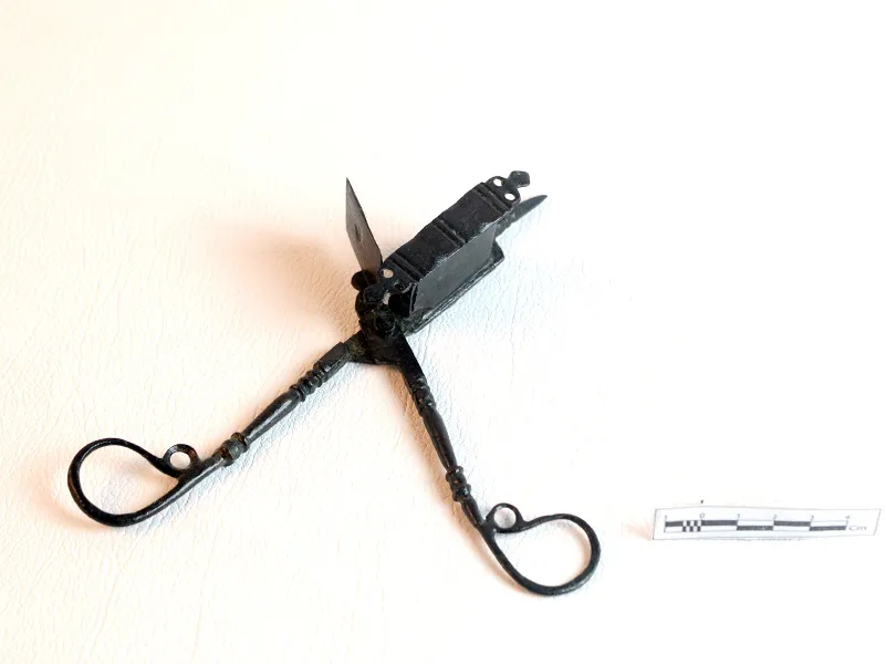 Candle snuffer — artifact at Maritime Archaeology Museum